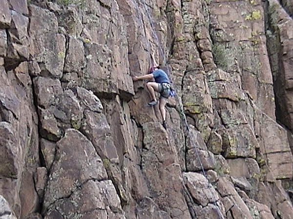 Golden Cliffs April 2001: Curtis Climbing Kevin Spies the Line