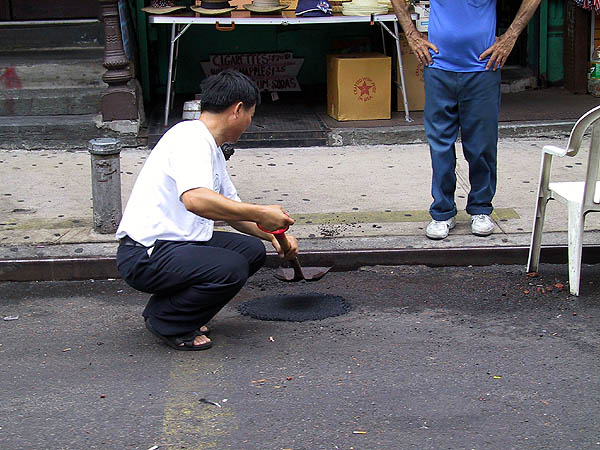 NYC 2002: Patching Potholes